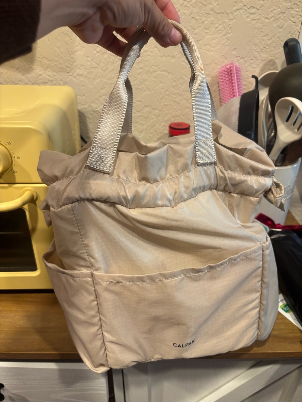CALPAK Insulated Lunch Bag Beige Neutral Drawstring Tote